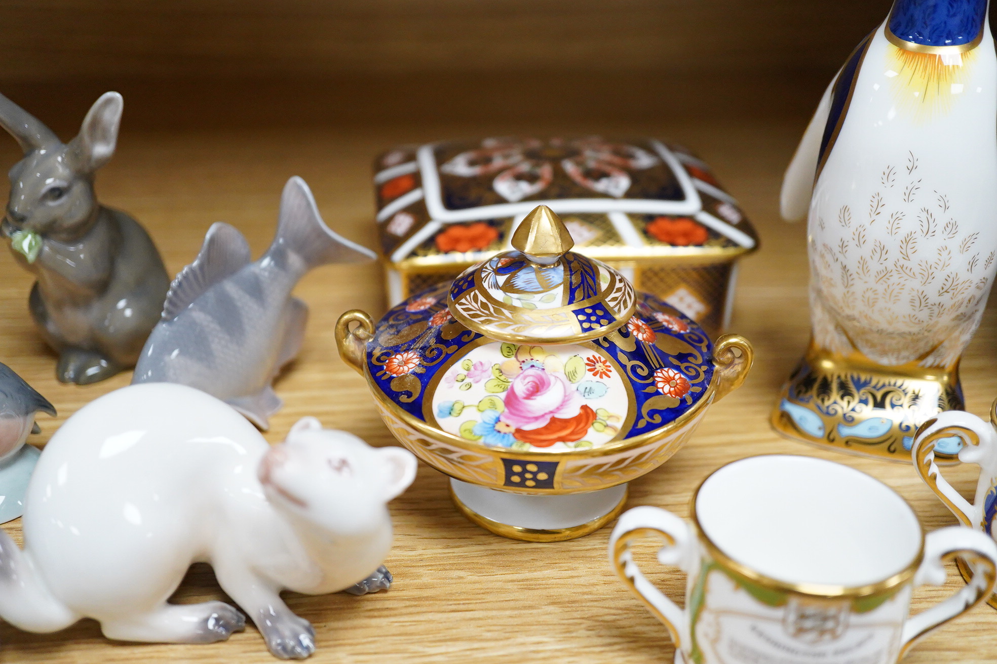 Six small Copenhagen figures, a Derby penguin and four other items